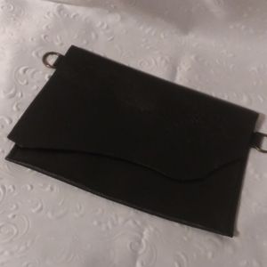 Handmade black leather clutch